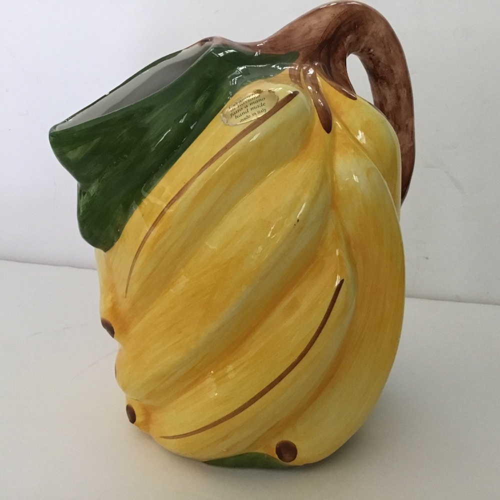 Pitcher. Ceramic , Banana shaped . Hand made. Bassano. Italy. New